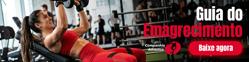 Mulher treinando com halteres em banco inclinado na academia, ao lado da chamada "Guia do Emagrecimento" da Cia Athletica com botão "Baixe agora".