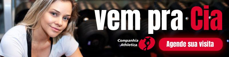 Banner da Cia Athletica com mulher na academia e convite “Vem pra Cia”